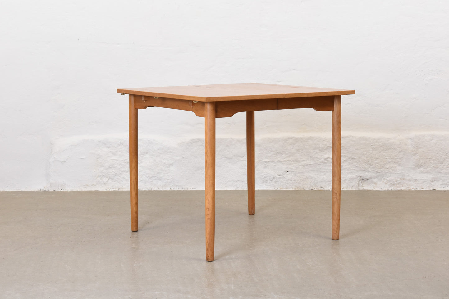 1960s extending drop-leaf dining table in oak