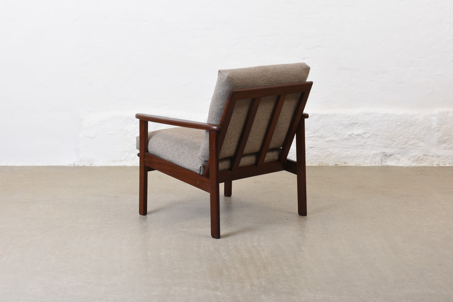 Two available: 1960s teak lounge chairs with new upholstery