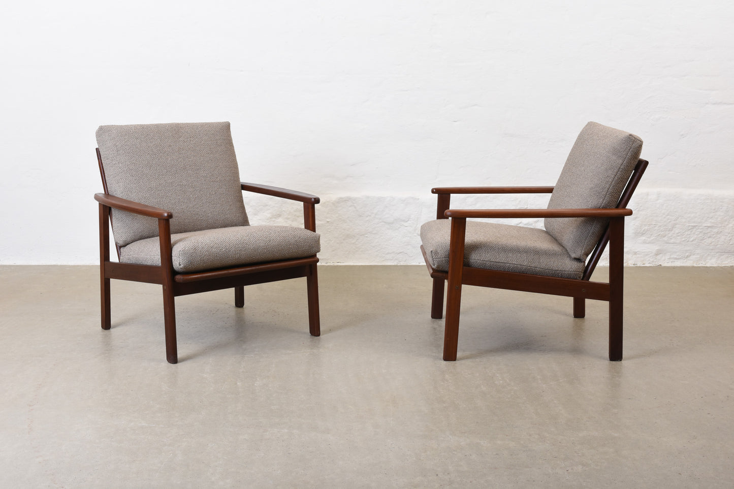 Two available: 1960s teak lounge chairs with new upholstery