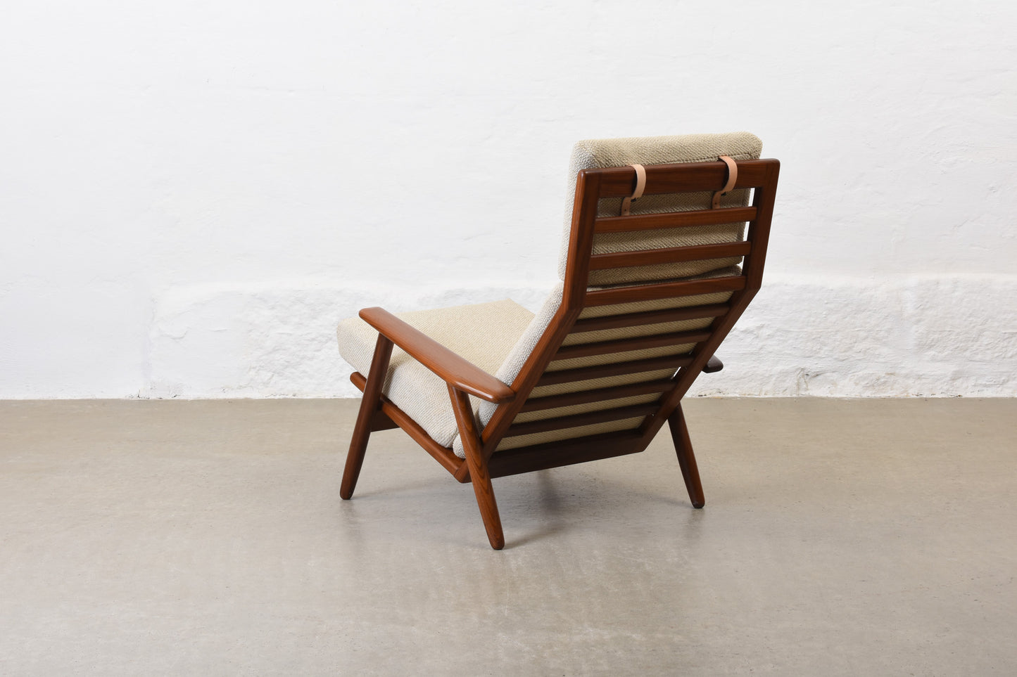 Newly reupholstered: 1960s high back teak lounger