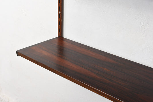 1960s bay of three rosewood shelves by Kai Kristiansen