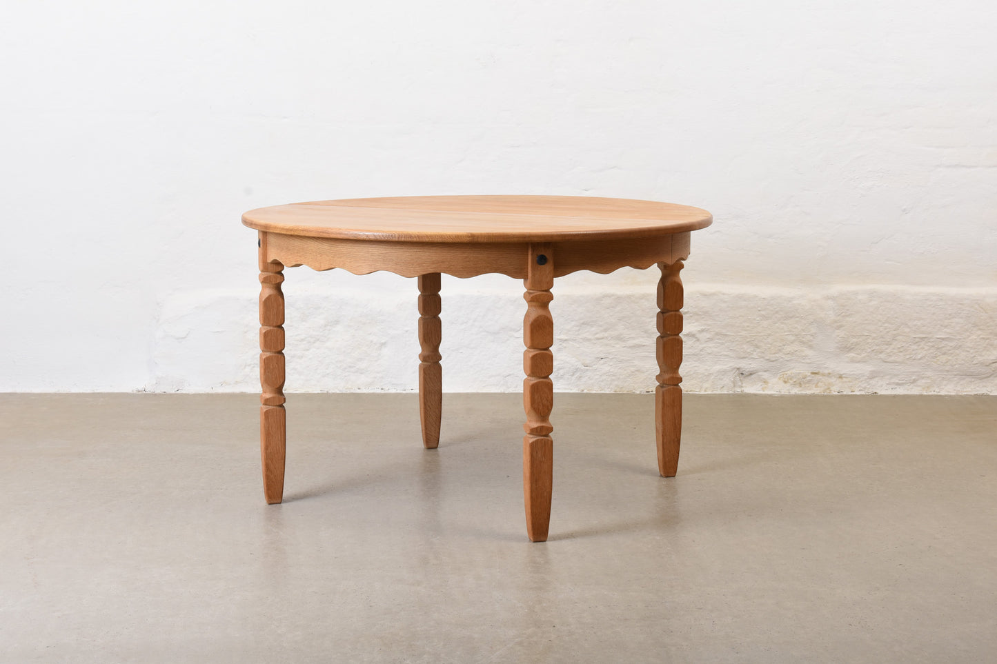 1970s extending oak dining table by Henning Kjærnulf