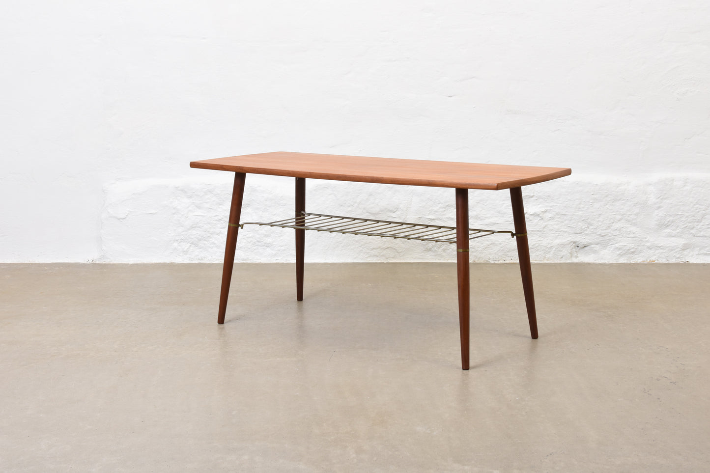 1960s teak coffee table with magazine shelf