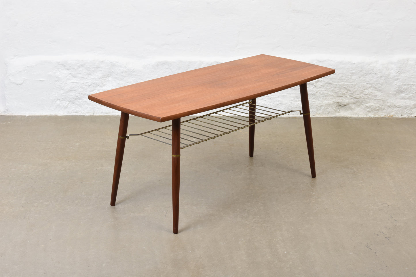 1960s teak coffee table with magazine shelf