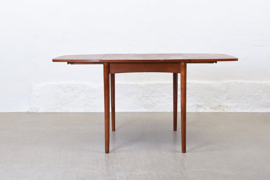 1960s extending dining table in teak with drop leaves