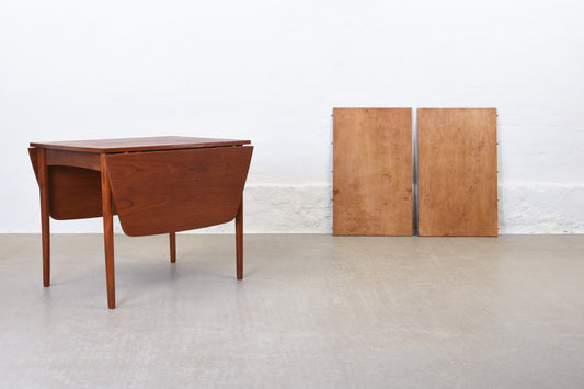 1960s extending dining table in teak with drop leaves