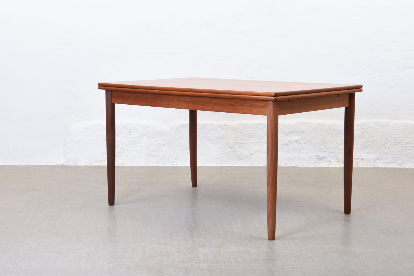 1960s extending dining table in teak by Rogenstrup Møbelfabrik