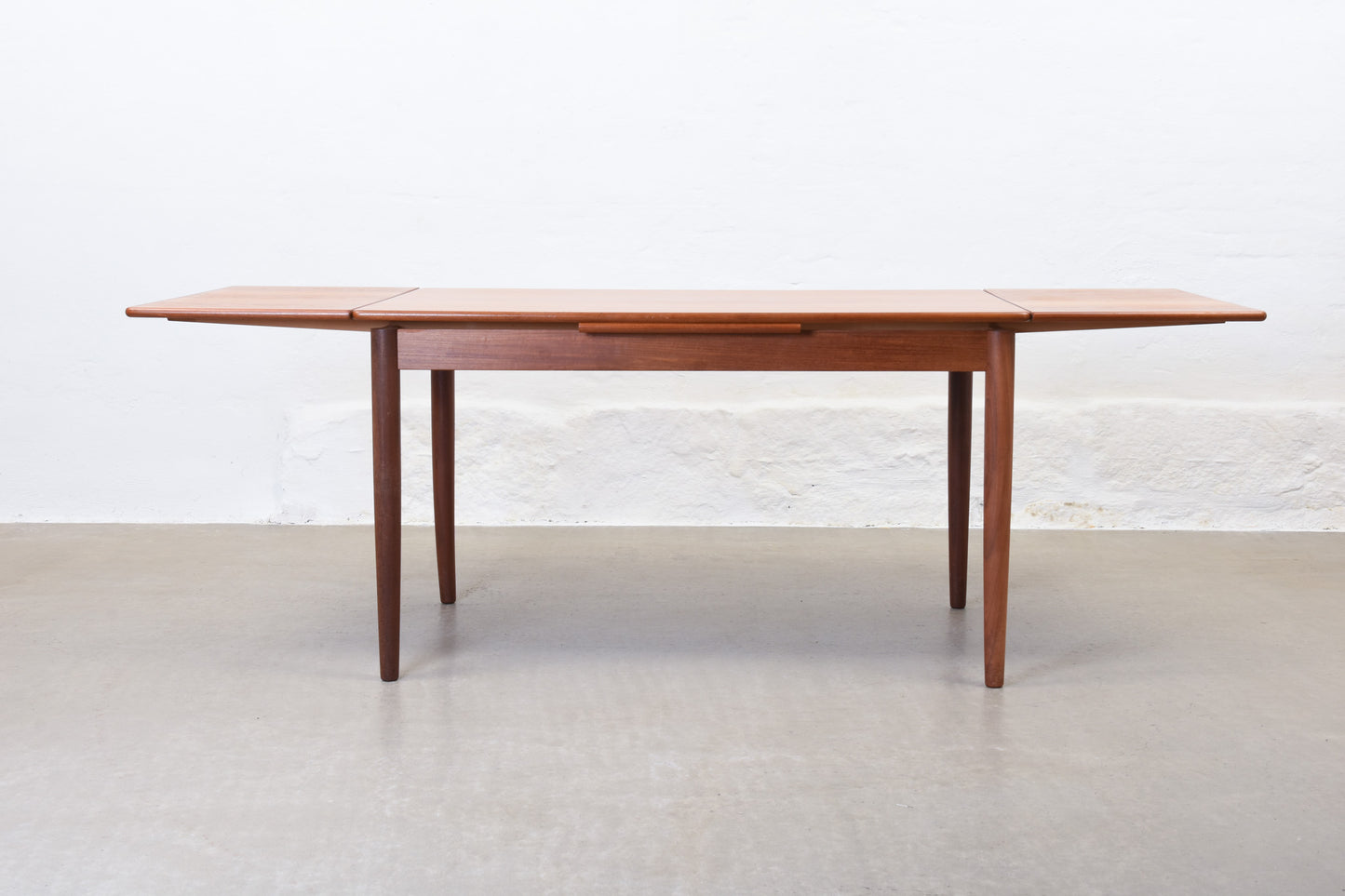 1960s extending dining table in teak by Rogenstrup Møbelfabrik