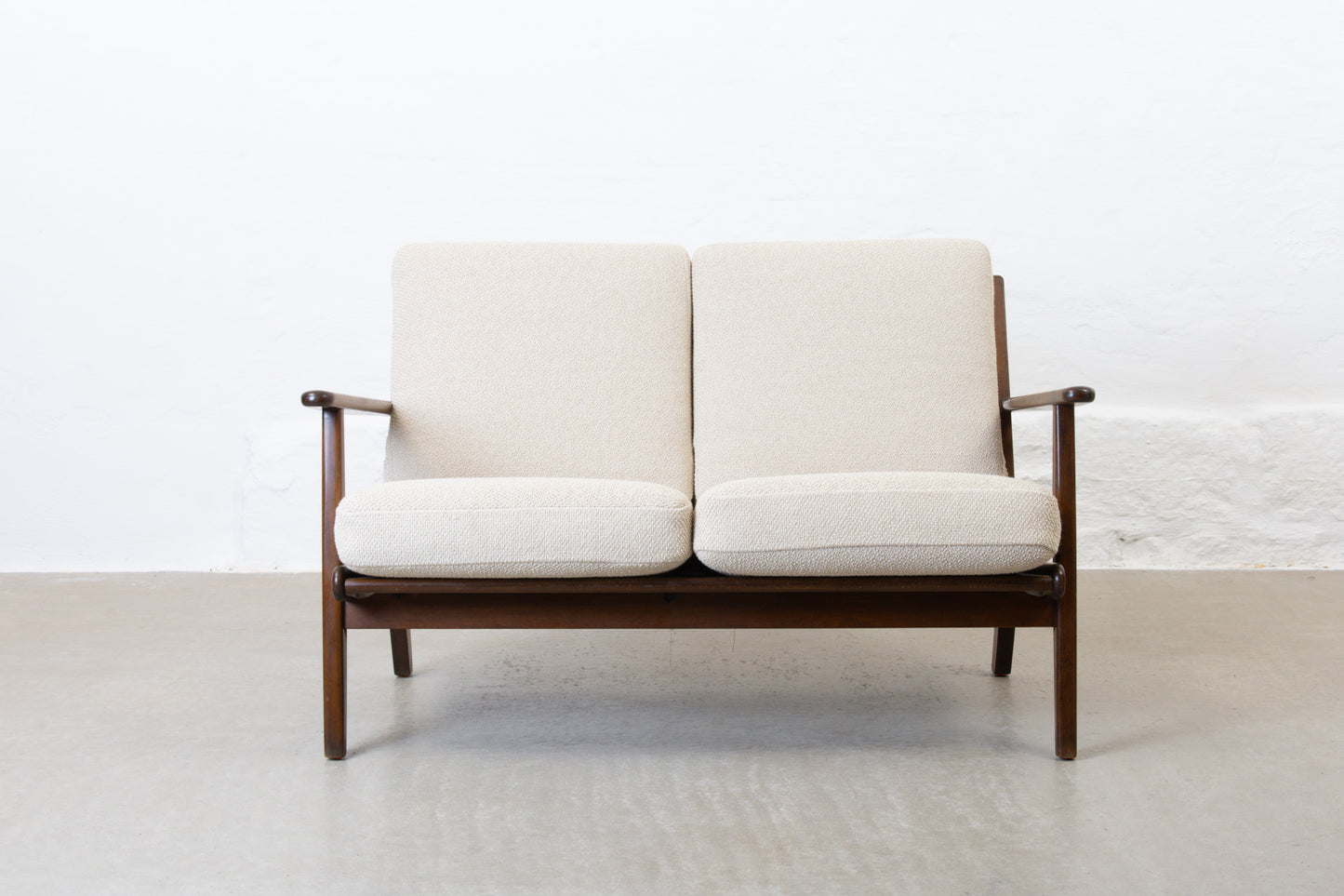 Newly reupholstered: 1950s two seater by Aage Pedersen