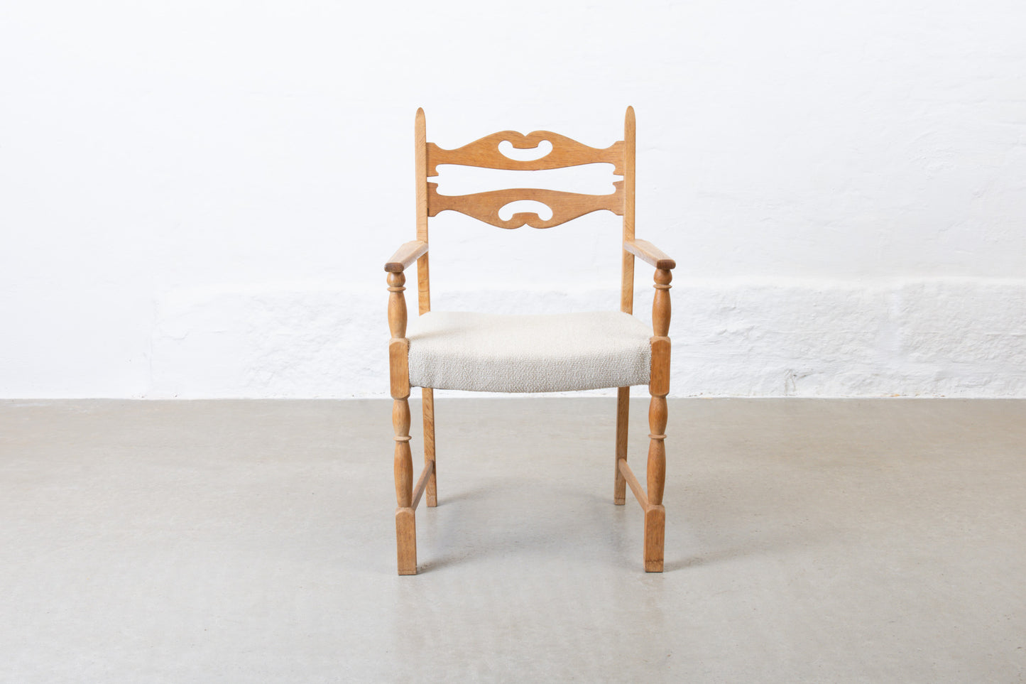 Newly reupholstered: 1970s armchair in oak