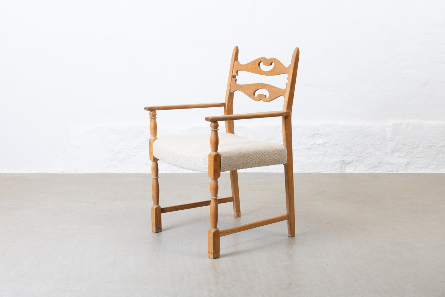 Newly reupholstered: 1970s armchair in oak