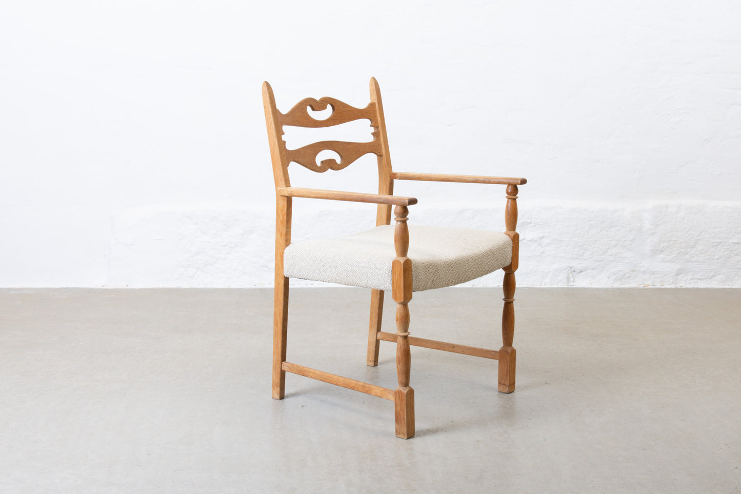 Newly reupholstered: 1970s armchair in oak