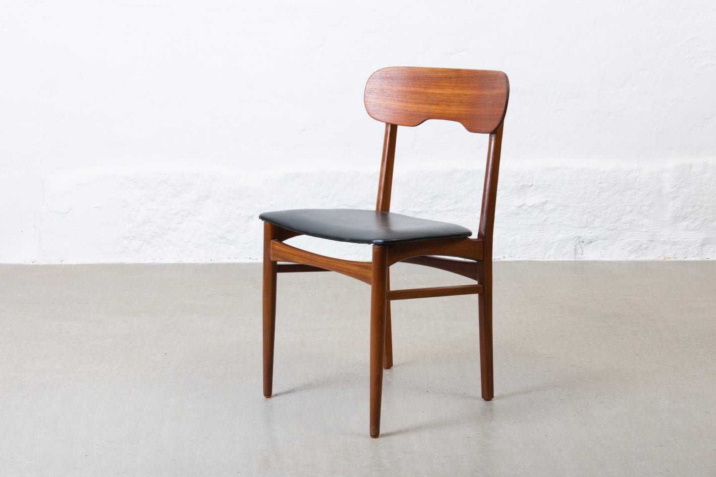 Three available: 1960s teak + vinyl chairs