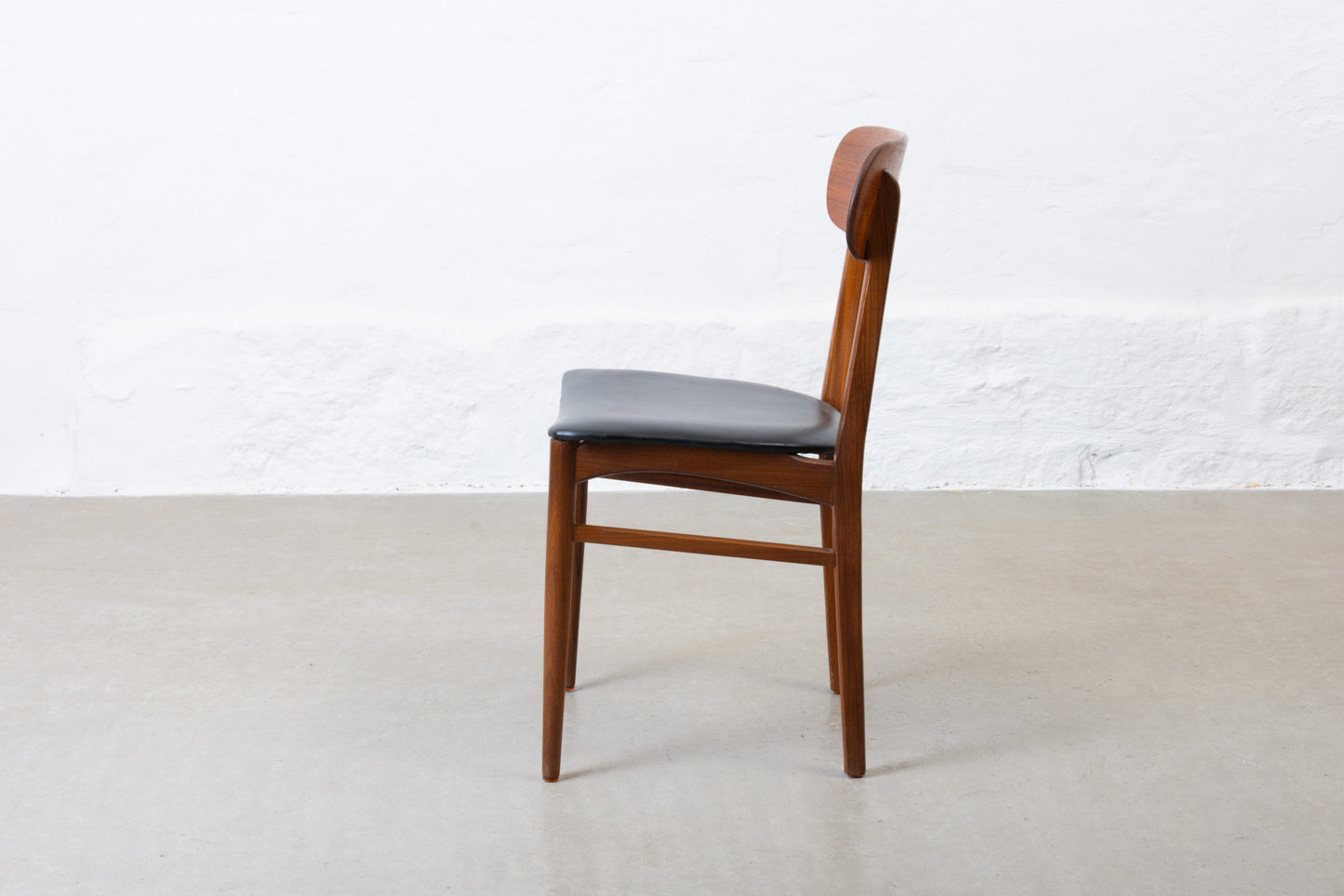 Three available: 1960s teak + vinyl chairs