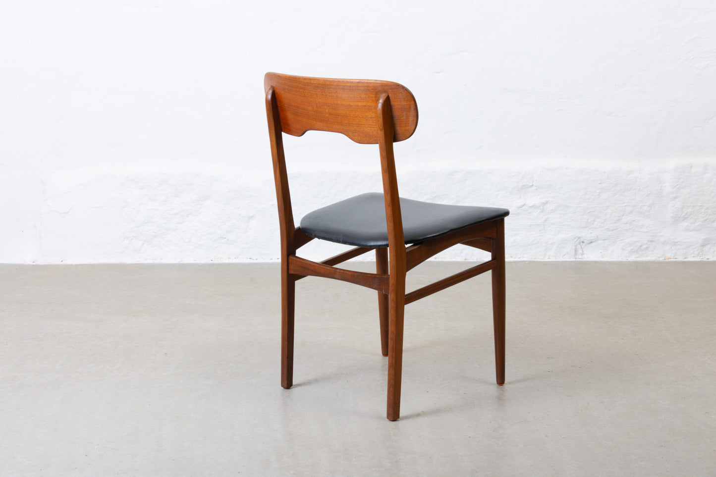 Three available: 1960s teak + vinyl chairs