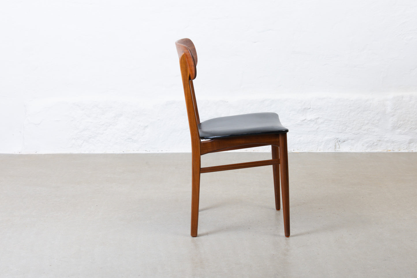 Three available: 1960s teak + vinyl chairs