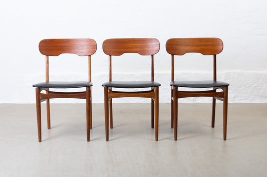 Three available: 1960s teak + vinyl chairs