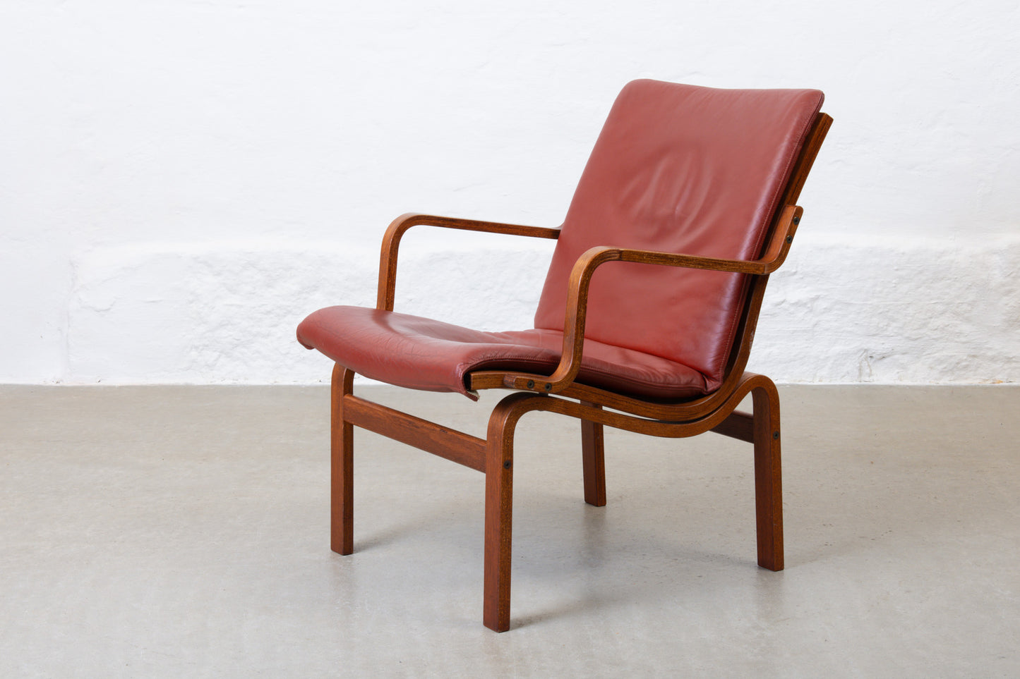 Two available: Beech + leather loungers by Nielaus Møbler