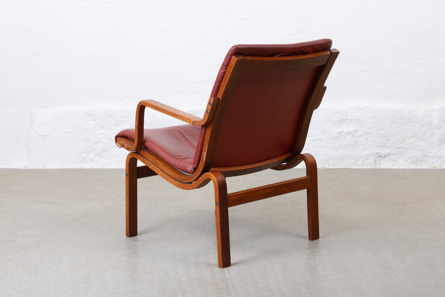 Two available: Beech + leather loungers by Nielaus Møbler