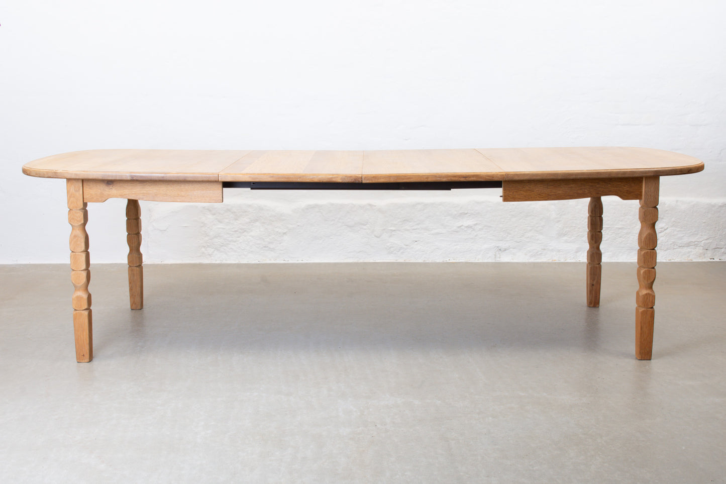 1970s extending oak dining table by CJ Rosengaarden