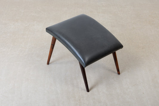 1960s leather foot stool on rosewood legs