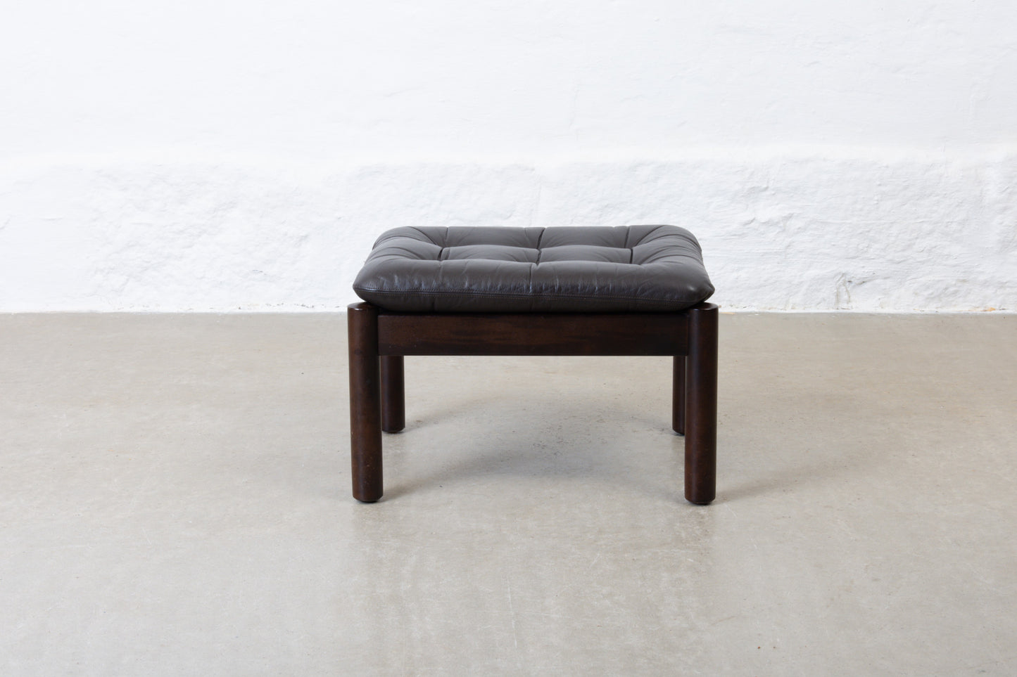 1960s foot stool in beech + leather
