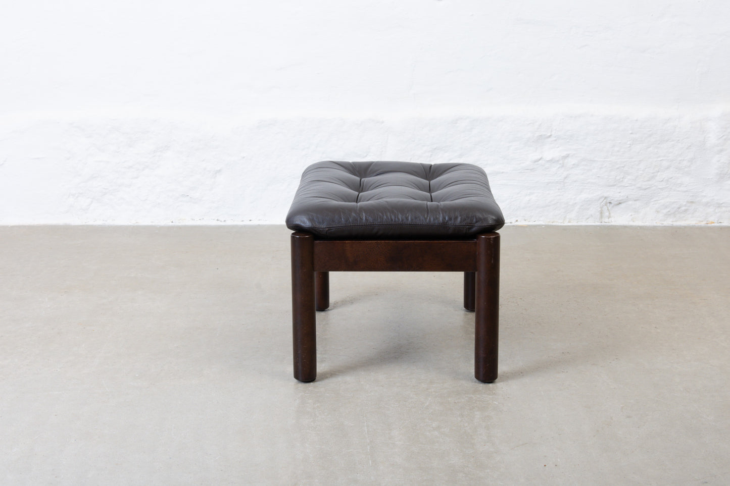 1960s foot stool in beech + leather