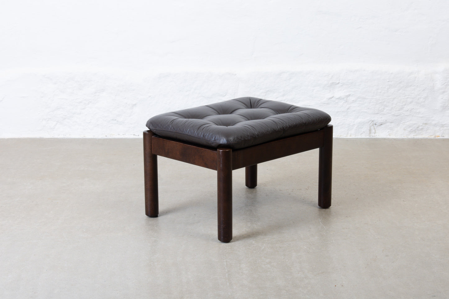 1960s foot stool in beech + leather