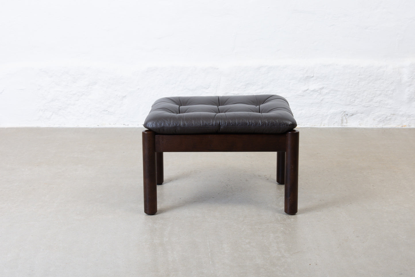 1960s foot stool in beech + leather