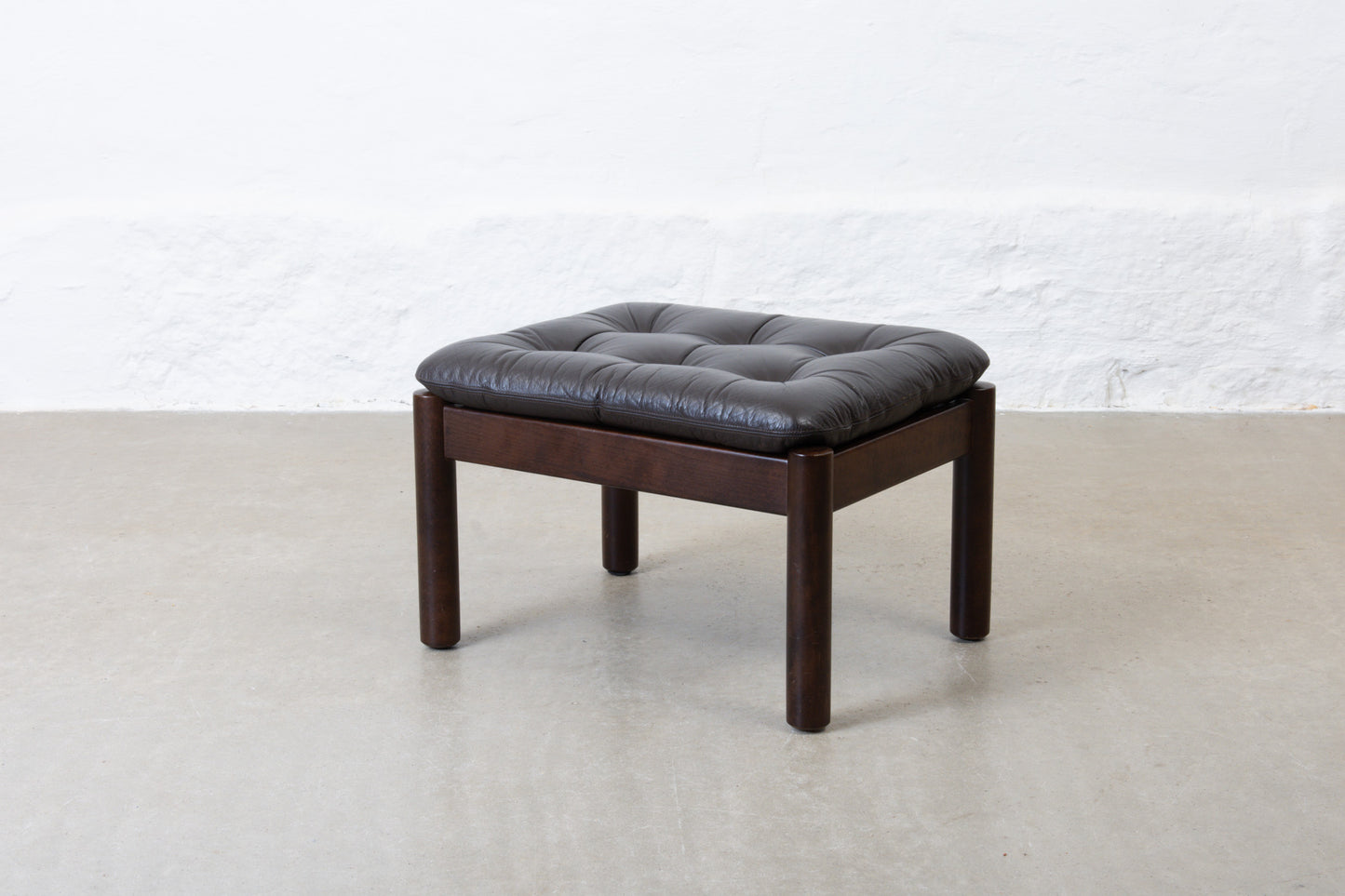 1960s foot stool in beech + leather