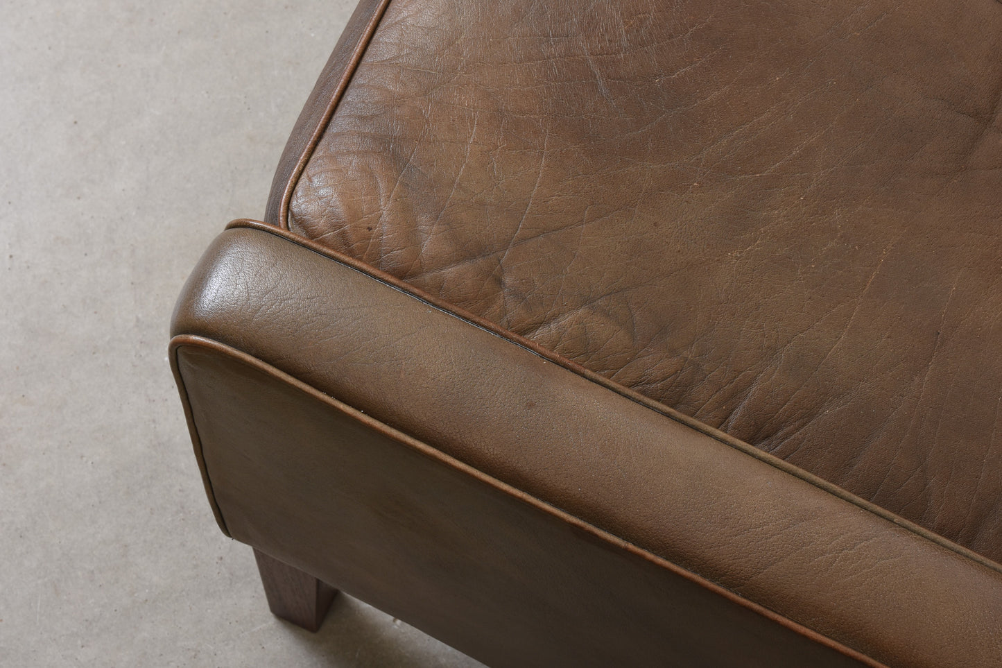 1960s two seat leather sofa on rosewood legs