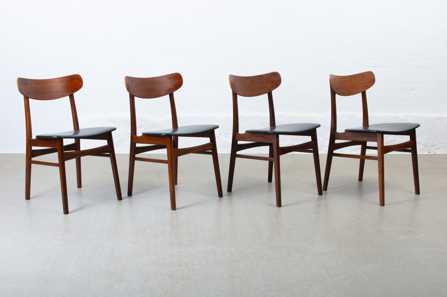 1960s set of four teak + vinyl dining chairs