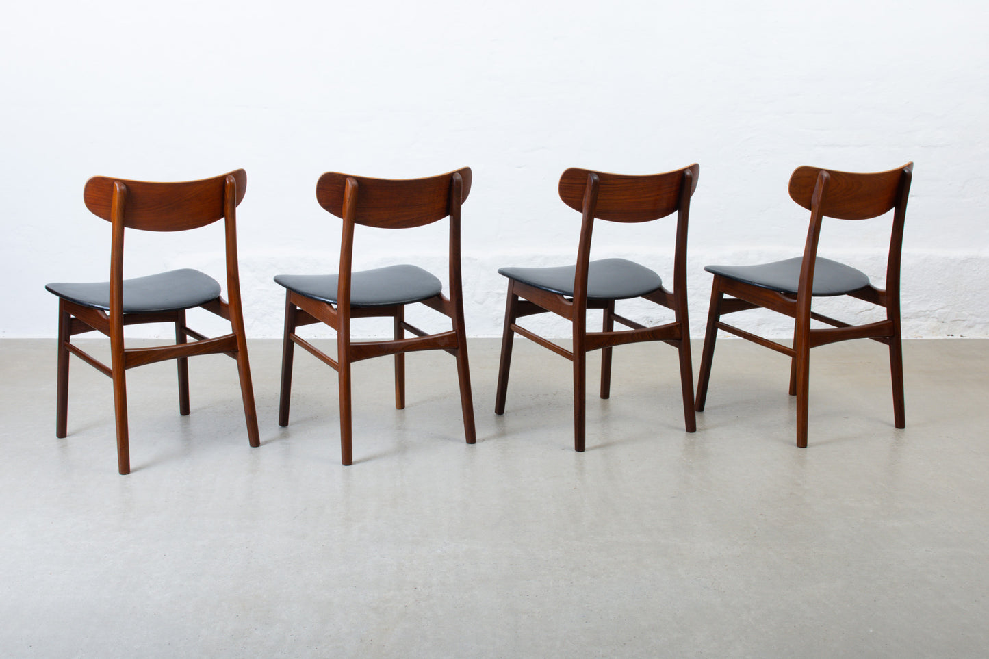 1960s set of four teak + vinyl dining chairs