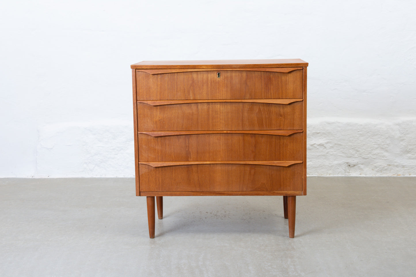 1960s teak chest of four drawers