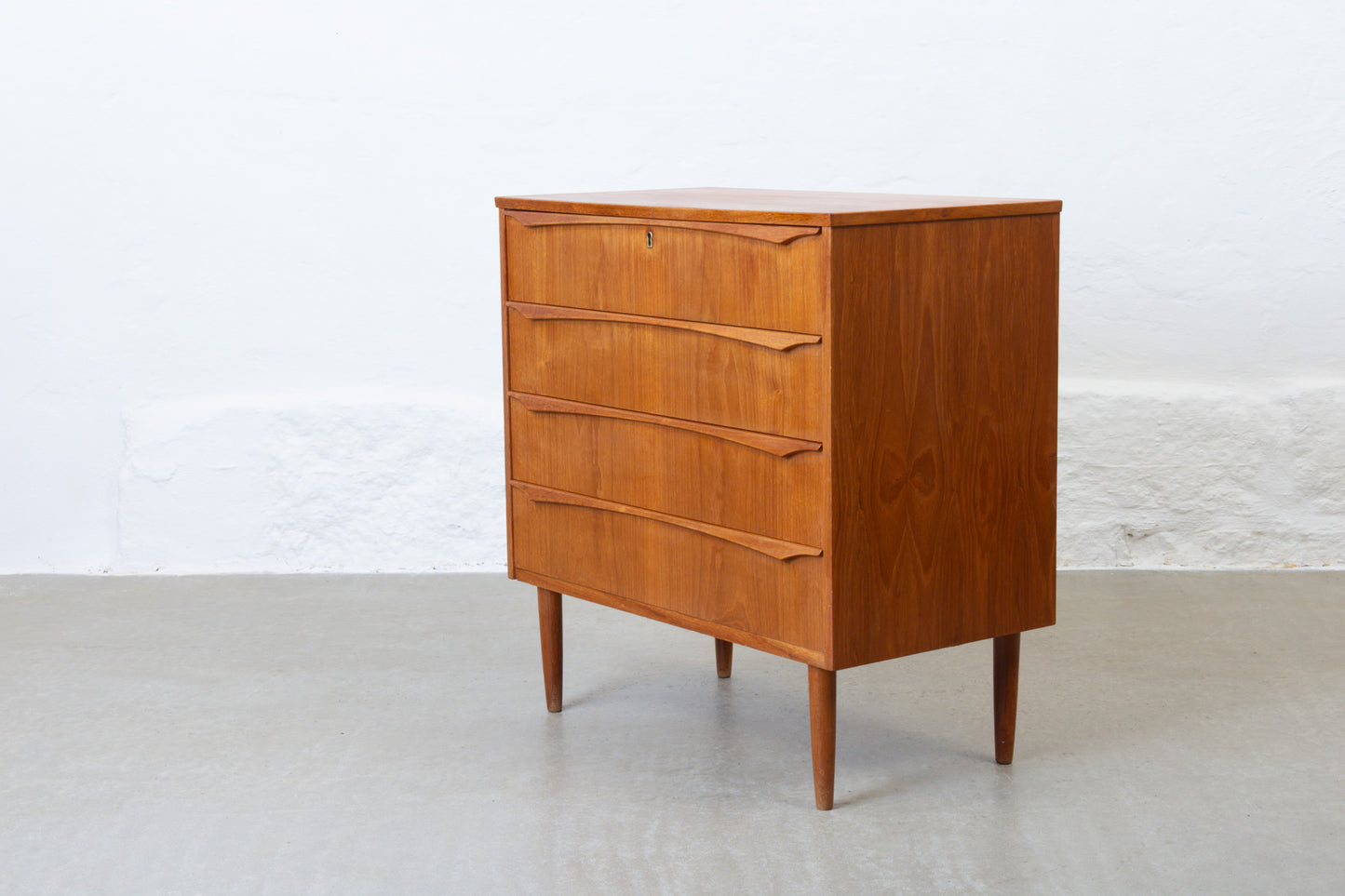 1960s teak chest of four drawers