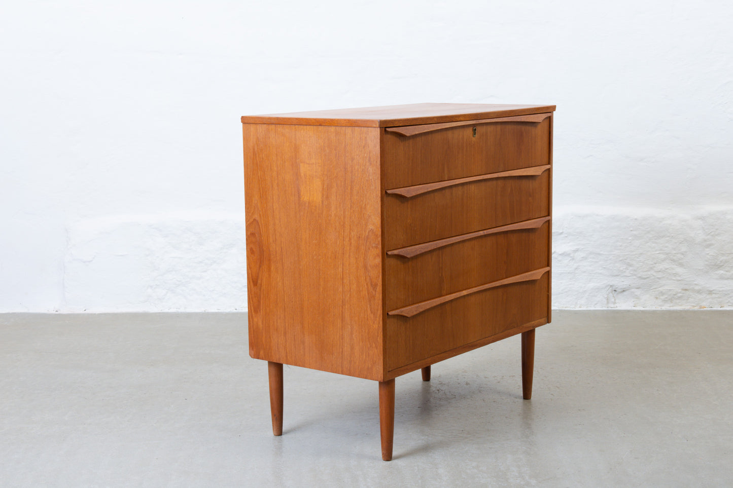 1960s teak chest of four drawers