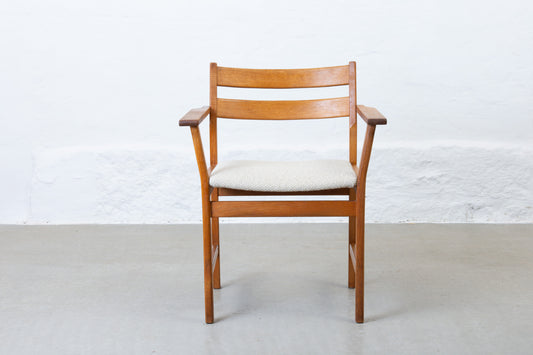 Newly reupholstered: 1960s oak armchair by Kurt Østervig