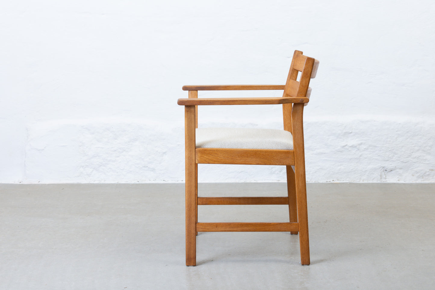 Newly reupholstered: 1960s oak armchair by Kurt Østervig