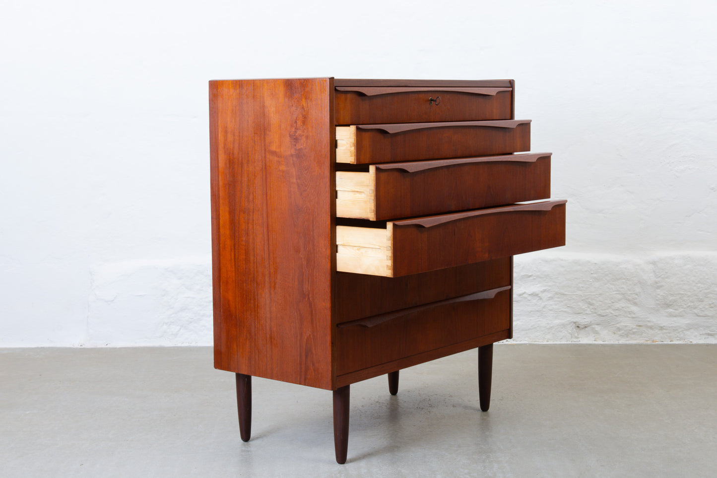 1960s teak chest of drawers with sculpted handles
