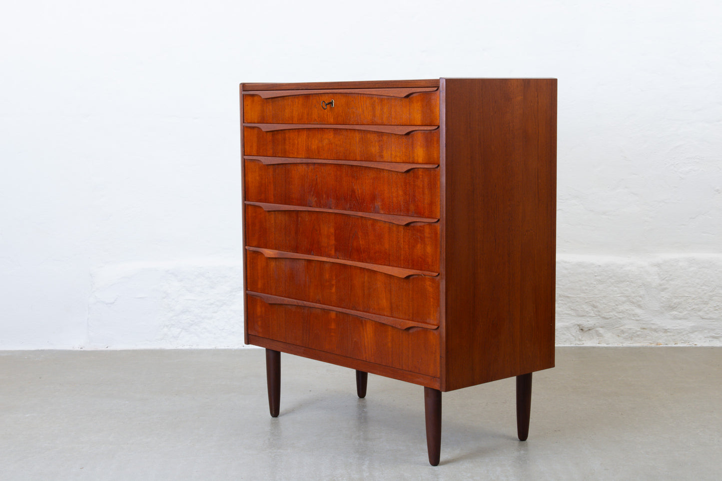 1960s teak chest of drawers with sculpted handles