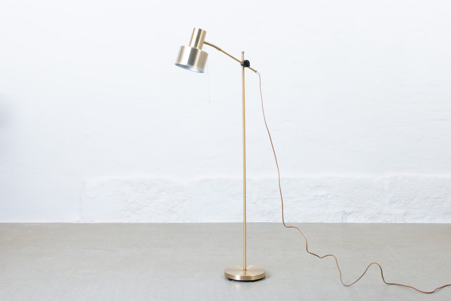 Two available: 1970s brass floor lamps