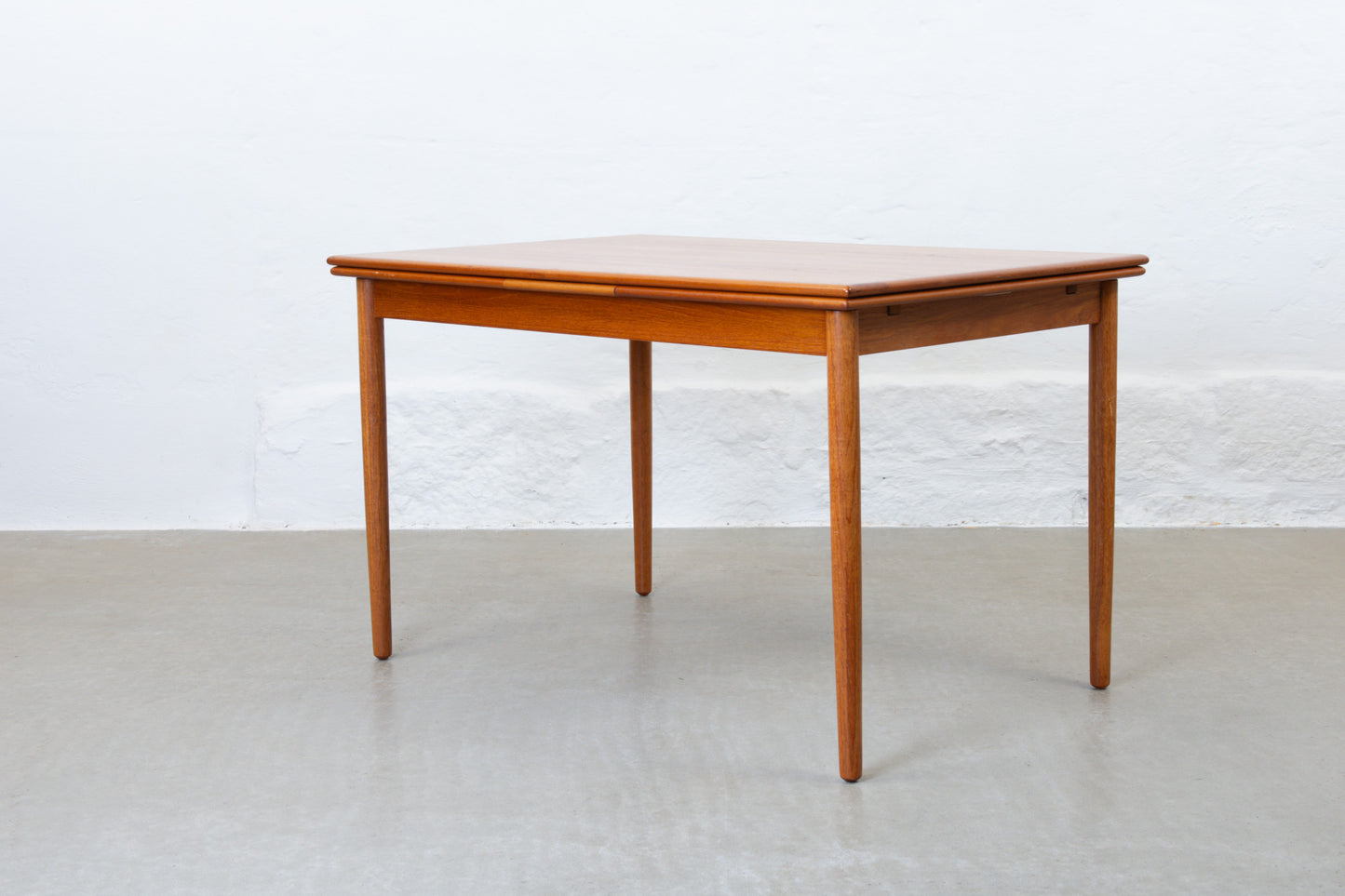 1960s extending dining table in teak - no. 1