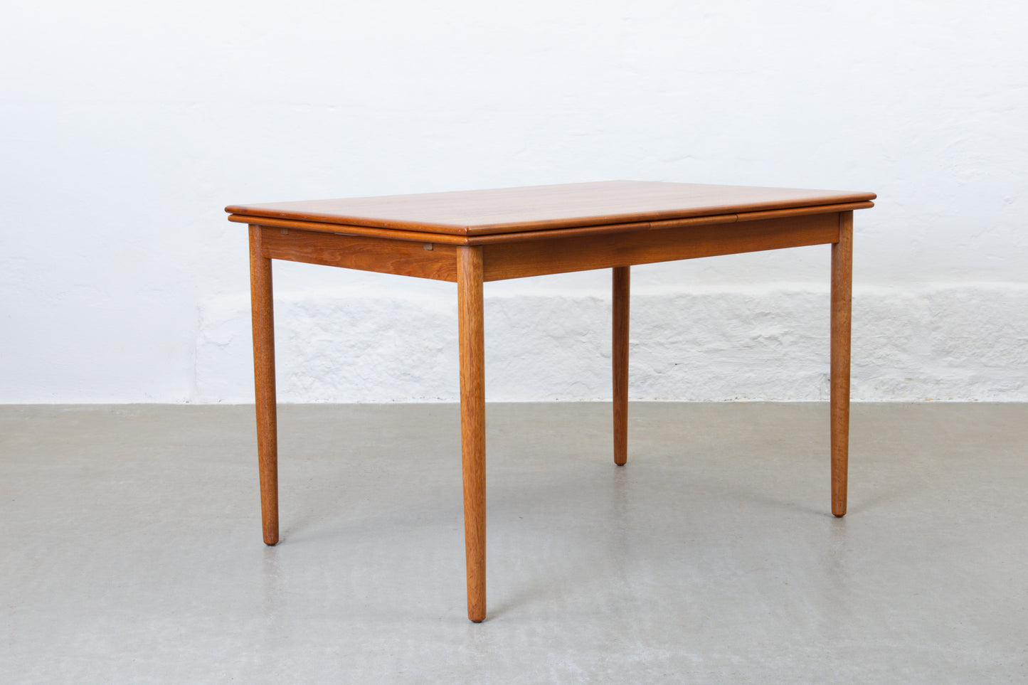 1960s extending dining table in teak - no. 1