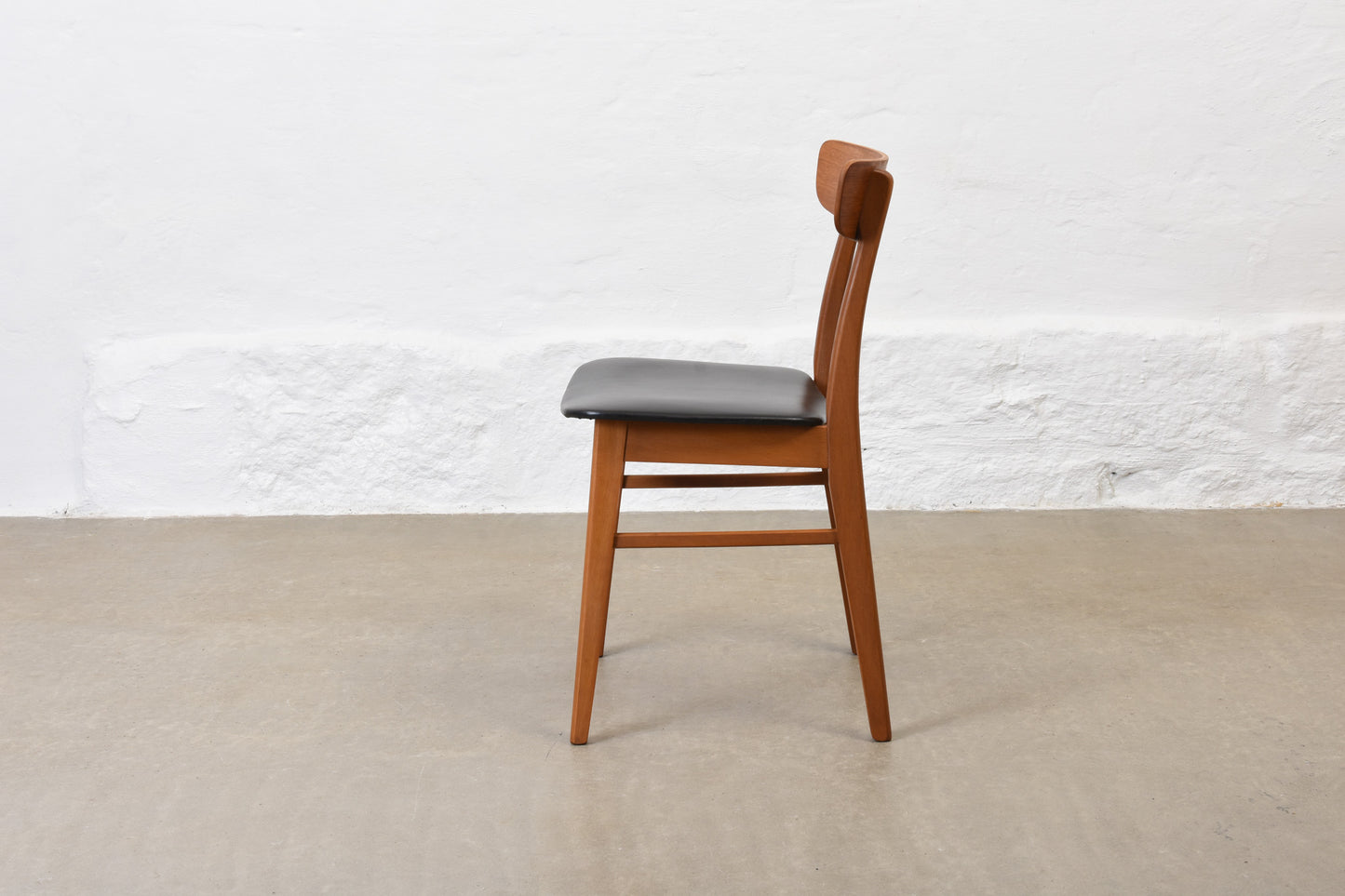 Set of four teak + beech dining chairs by Farstrup