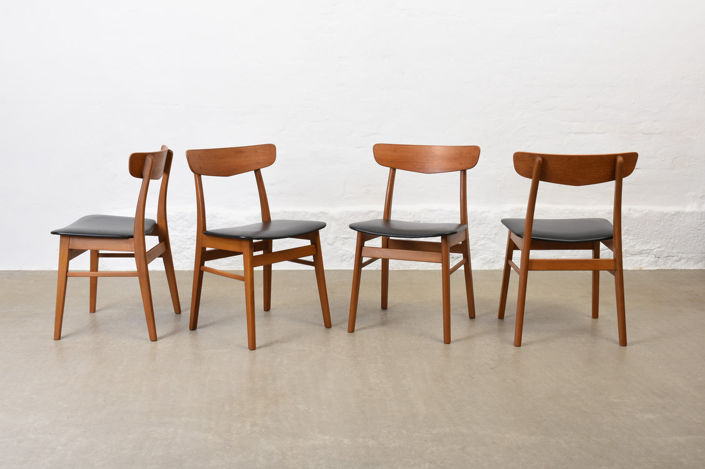 Set of four teak + beech dining chairs by Farstrup