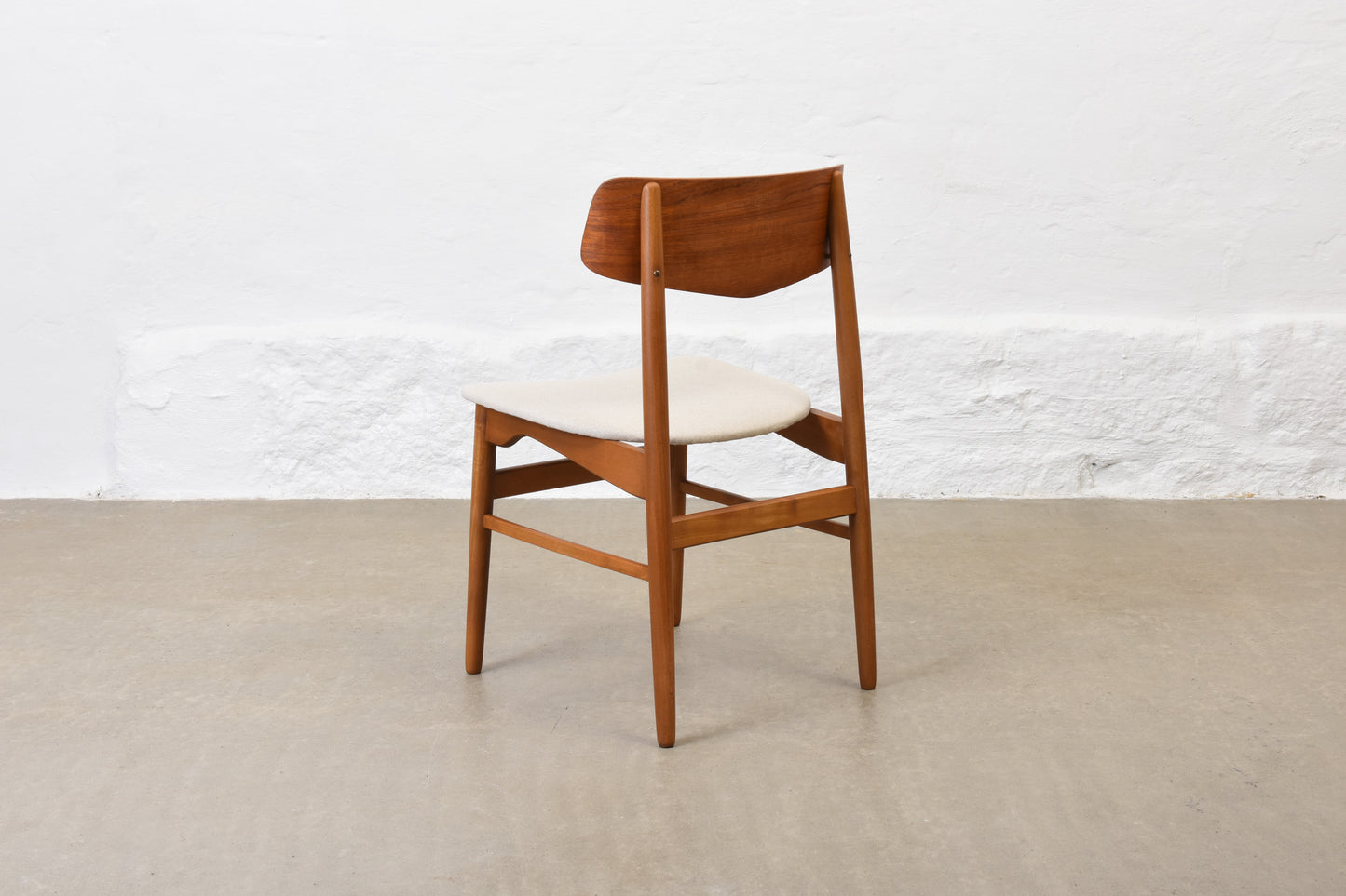 Newly reupholstered: 1960s set of four teak + beech dining chairs