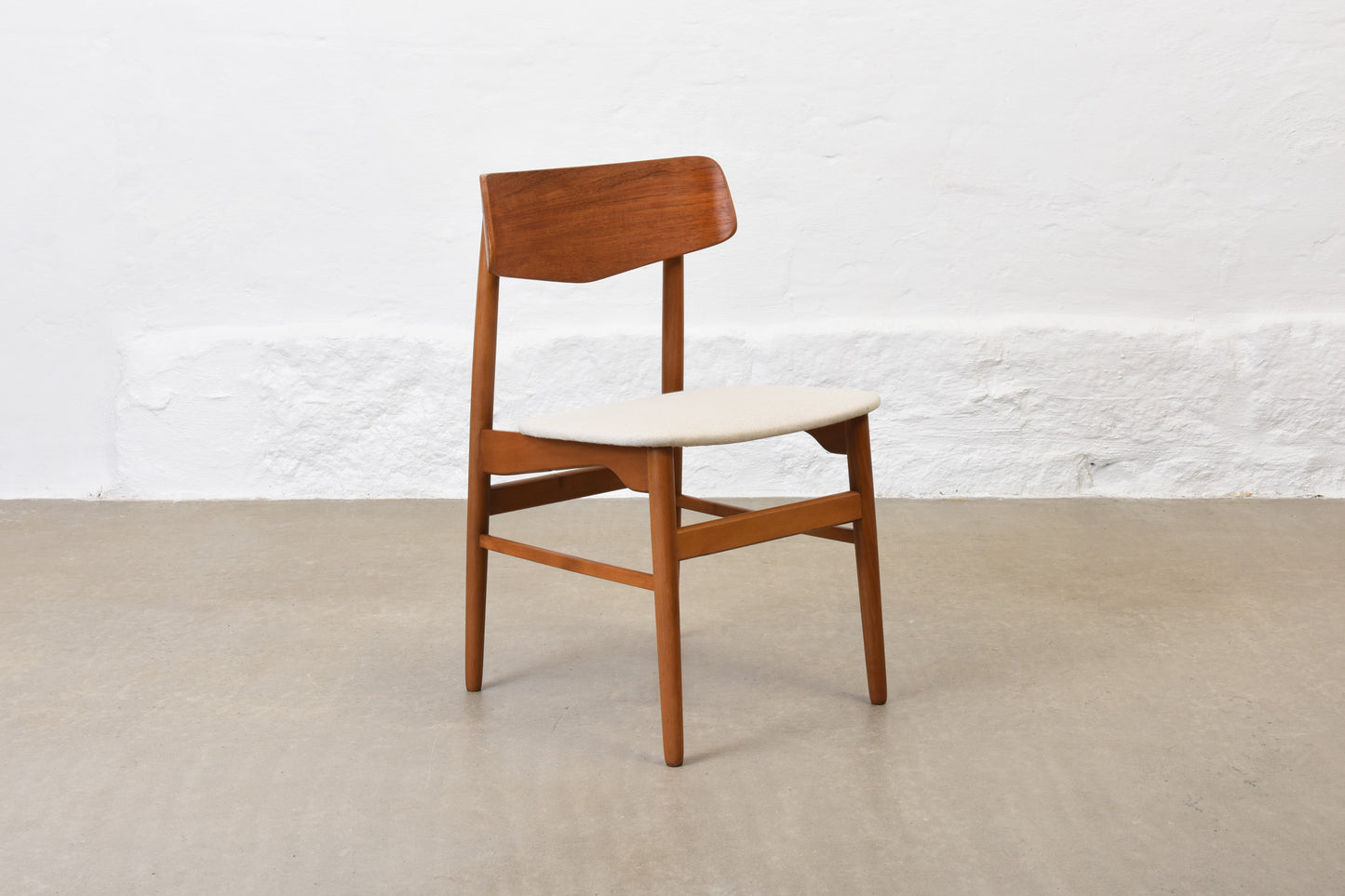 Newly reupholstered: 1960s set of four teak + beech dining chairs