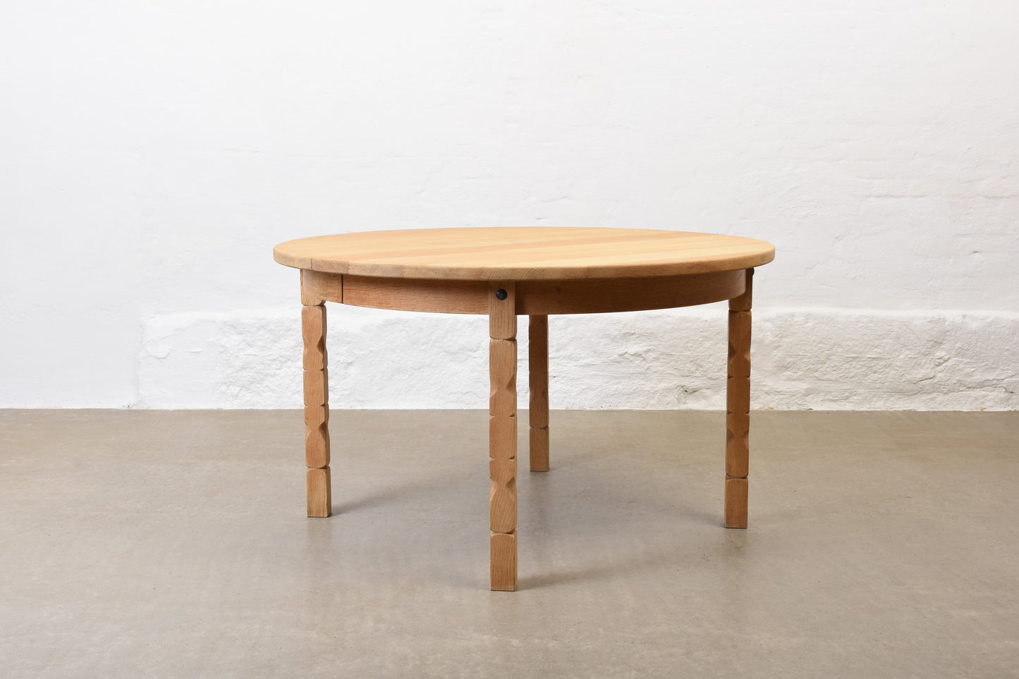 1970s extending oak dining table by Henning Kjærnulf