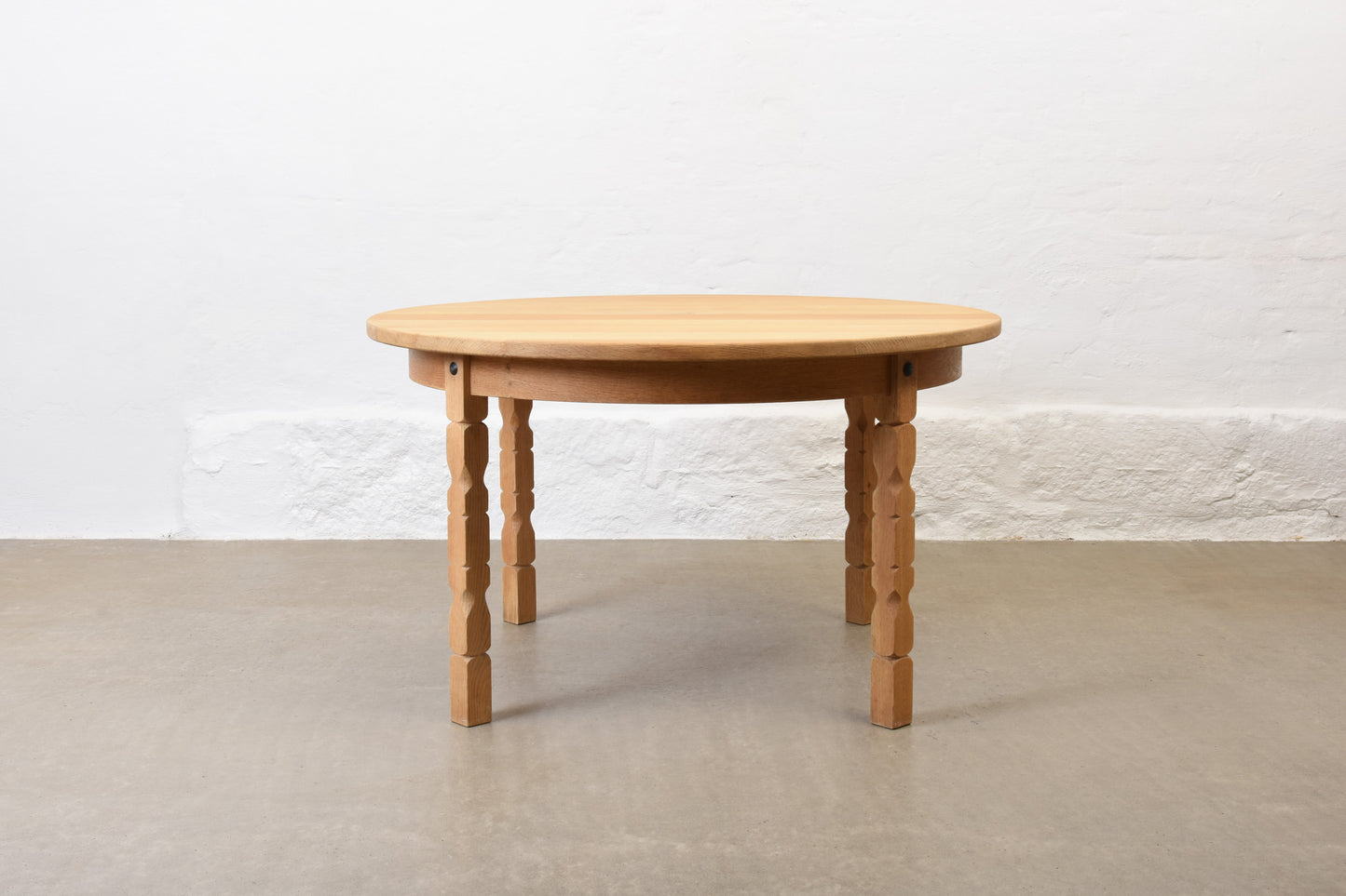 1970s extending oak dining table by Henning Kjærnulf