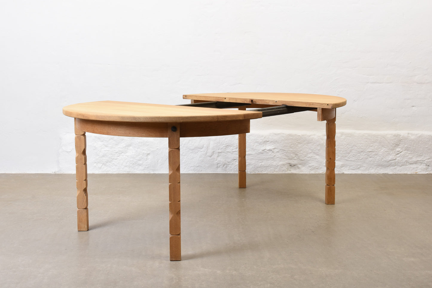 1970s extending oak dining table by Henning Kjærnulf